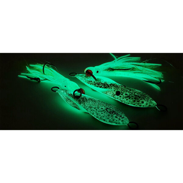 Here's a go at it: Get ready to light up the depths with our Catch Boss Squid Inchiku Jig lures! These bad boys come with luminescent speckled patterns and sassy fringed tails, looking fierce against a dark backdrop. They're just itching to dive in and get to work!.
