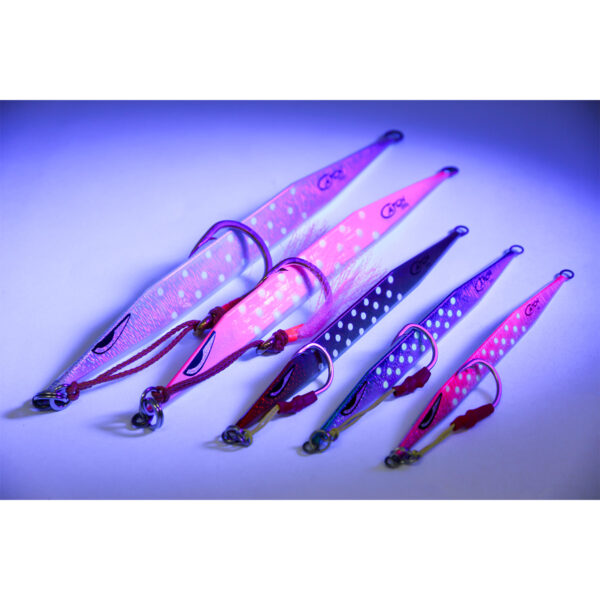 Check out these six Catch Double Trouble Jig fishing lures, flaunting metallic and dotted designs that'll make any fish take a second look. With vibrant colors that pop against a blue-lit backdrop, these lures are the real deal when it comes to standing out on the water.