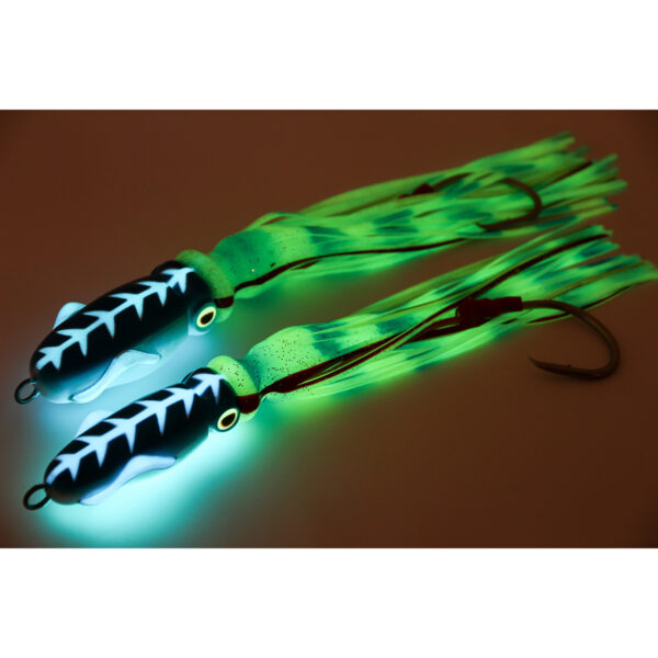 Get ready to elevate your fishing game with the Catch Giant Squidwings Jig! These luminous lures are a must-have in any angler's tackle box, showcasing an eye-catching black and white pattern accented by vibrant green fringes. Perfect for attracting big catches, their sleek design and sturdy hooks ensure you’re equipped for success, even when the waters get dark.