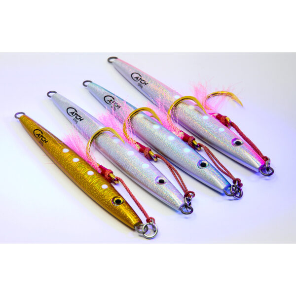 Meet the Catch The Joker Longfall Jigs, your new underwater showstoppers! Lined up and ready to dance, we've got five of these beauties: four dressed in sleek silver with a dash of pink flair and one standout in shimmering gold with playful white dots. They're eagerly waiting for their chance to make a splash beneath the waves. Get ready for some serious jigging action!.