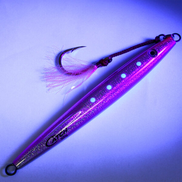 Introducing the "Catch The Joker Longfall Jig" – a purple metallic marvel that’s as cunning as its name suggests. Decked out with striking white dots on a mesmerizing bluish backdrop, this lure is your ticket to reeling in the big ones. And with its large, sharp hook, you're all set for a day of angling adventure. Get ready to up your fishing game!.