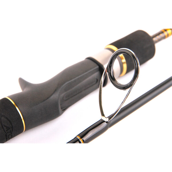 Get up close and personal with the sleek black Catch Kensai Pro Series Slow Pitch Jigging Rod handle. With its sharp line guide in focus and eye-catching metallic accents, it’s crafted perfectly for mastering those slow pitch techniques.